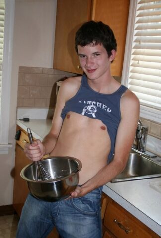 73960795_012_f641 Naughty gay Devin Moss strips naked & jerks his big dick while baking