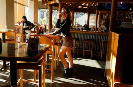 75252135_029_739c Amateur babe in glasses Olivia Yukon teases with her amazing ass in public