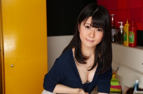 75512377_005_f3e7 Japanese chick Mai Araki shows her ass and snatch while in the kitchen