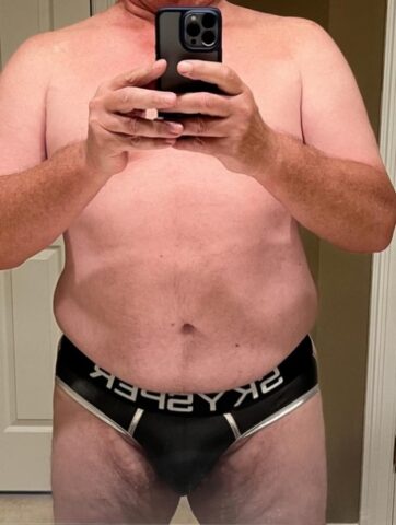 Horny chubby gay gets his ass eaten and fucked from behind on his bed