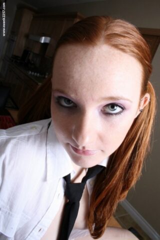 85572363_007_9789 Ponytailed schoolgirl Gypsy shows her shaved pink pussy up close