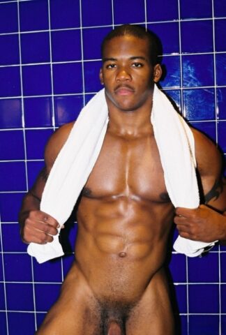 Black gay with hot muscles Houston A exposes his big prick after a gym workout