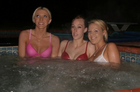 88914730_026_cdb8 Lesbian teens Cari, Nadia, and Vanessa strip and pose naked in the jacuzzi