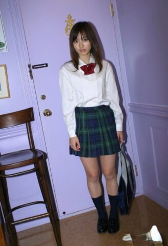 93155606_001_ccec Naughty asian schoolgirl Hikaru Koto slipping off her uniform