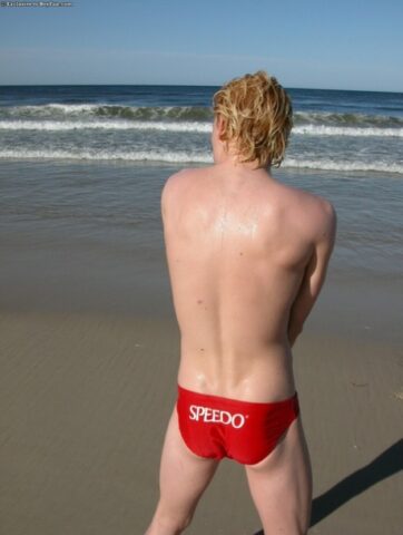 Horny gay blonde Jarrod plays with his uncut dick on the beach and at home