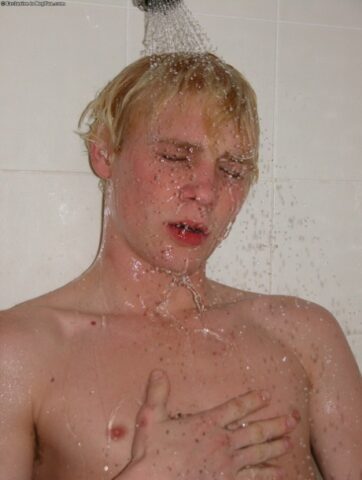 Horny gay blonde Jarrod plays with his uncut dick on the beach and at home