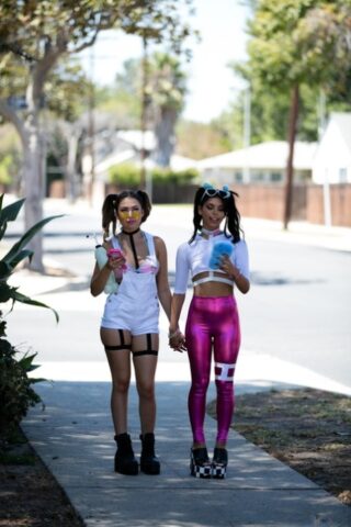 Beautiful lesbians Melissa Moore and Gina Valentina stripping for us