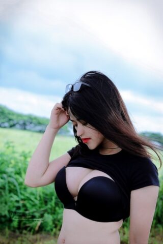 98009245_022_aa19 Sexy brunette babe Jessica Nguyễn flaunts her cleavage and flashes her tits
