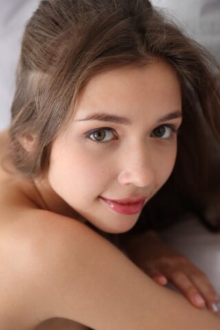 98051221_055_0c0e Lovely Ukrainian babe Mila Azul teases with her beautiful big tits on her bed