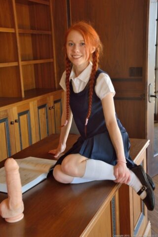 99305303_017_75d1 Ginger schoolgirl Dolly inserts a huge fake cock & Ben Wa balls into her pussy