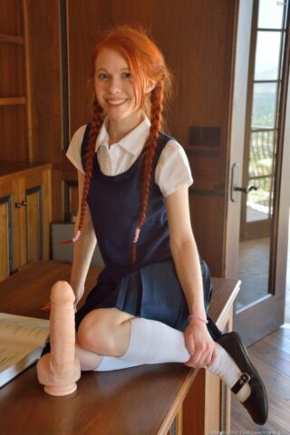99305303_018_75d1 Ginger schoolgirl Dolly inserts a huge fake cock & Ben Wa balls into her pussy
