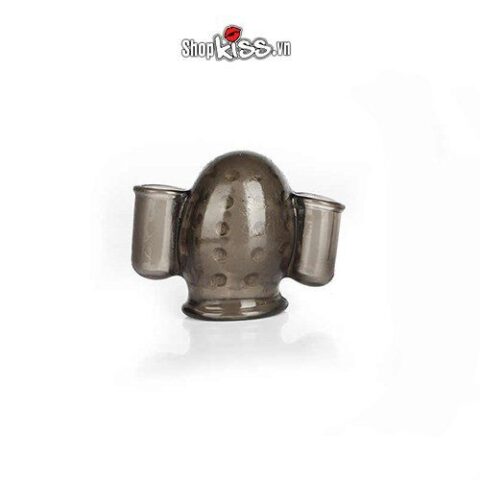 Hình ảnh bao rung quy đầu DC33 màu đen trong suốt đặt cạnh hộp đựng, thể hiện tính chính hãng và chất lượng.