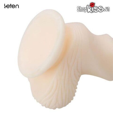 Phần đế hút chân không của dương vật silicon DV63 đang bám chắc vào bề mặt phẳng
