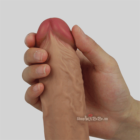 Ảnh động dương vật silicon Lovetoy Nature 2 thớ DV58E đang được bóp nhẹ, thể hiện độ mềm dẻo và đàn hồi, phù hợp cho chị em độc thân thủ dâm.