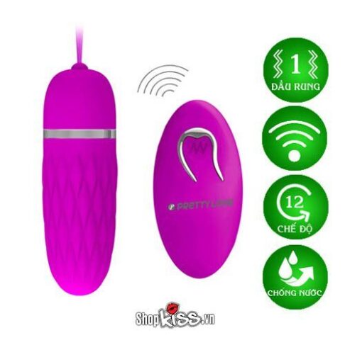 Trứng rung EG30A đặt cạnh hộp đựng và bộ điều khiển, thể hiện sự tiện lợi
