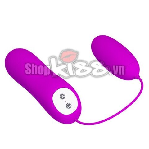 Trứng rung Prettylove Eunice EG31B màu hồng mềm mịn bên cạnh bộ điều khiển có dây.