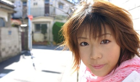 61727821_002_ba99 Japanese MILF Mai Haruna undoes her winter coat while wearing a bra and thong