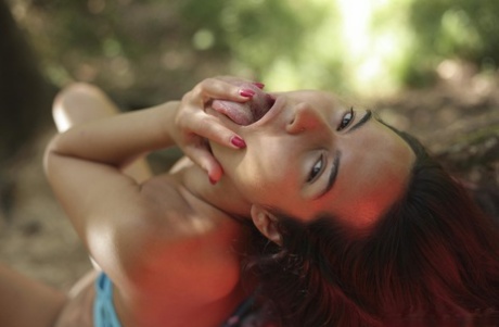83261807_069_119c Amateur teen with small breasts Monica Brown strips & masturbates in the woods