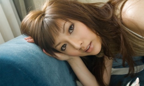 12221527_005_9541 Lovely asian teenage babe slowly taking off all of her clothes