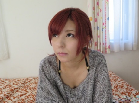 55399253_001_d55a Redheaded Japanese girl Saya Fujiwara has her wrists bound before fucking