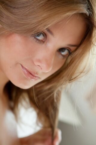 72313270_068_9ad4-1 Absolutely gorgeous teen Edwige A shows her trimmed cunt on a bed up close