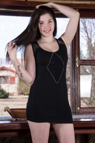 82432818_002_7d12 Brunette amateur Virgin shows her round boobs and hairy muff in a solo