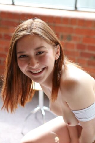 64690383_043_4201-1 Beautiful teen with big ass Lulu Reynolds unveils her tiny tits and red thongs